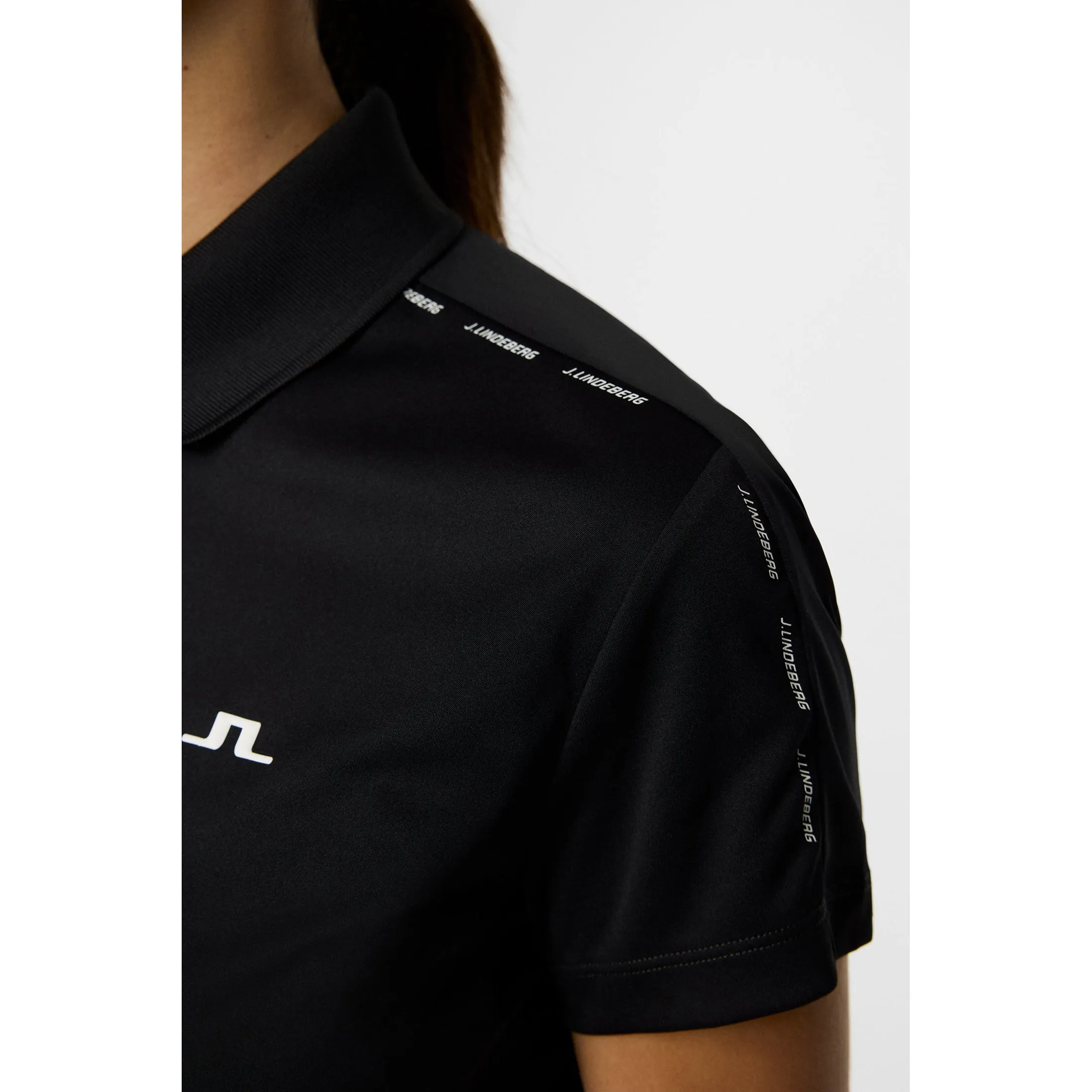 J.Lindeberg Women's Jessa Golf Polo Shirt - Black MatteFinishTexture Planet Care