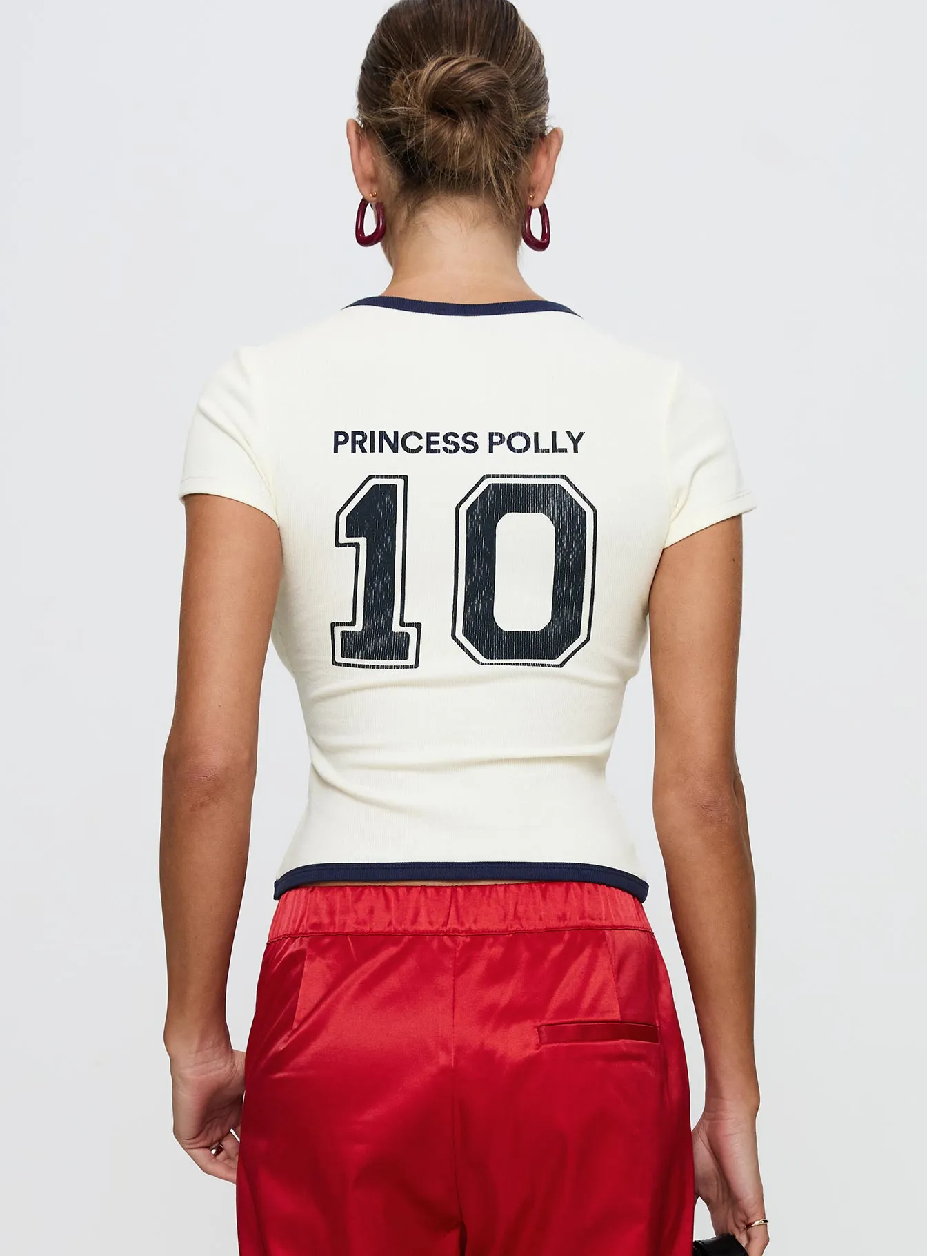 Track Record Graphic Top Cream Quick Wear Flexible Shoulder Seams