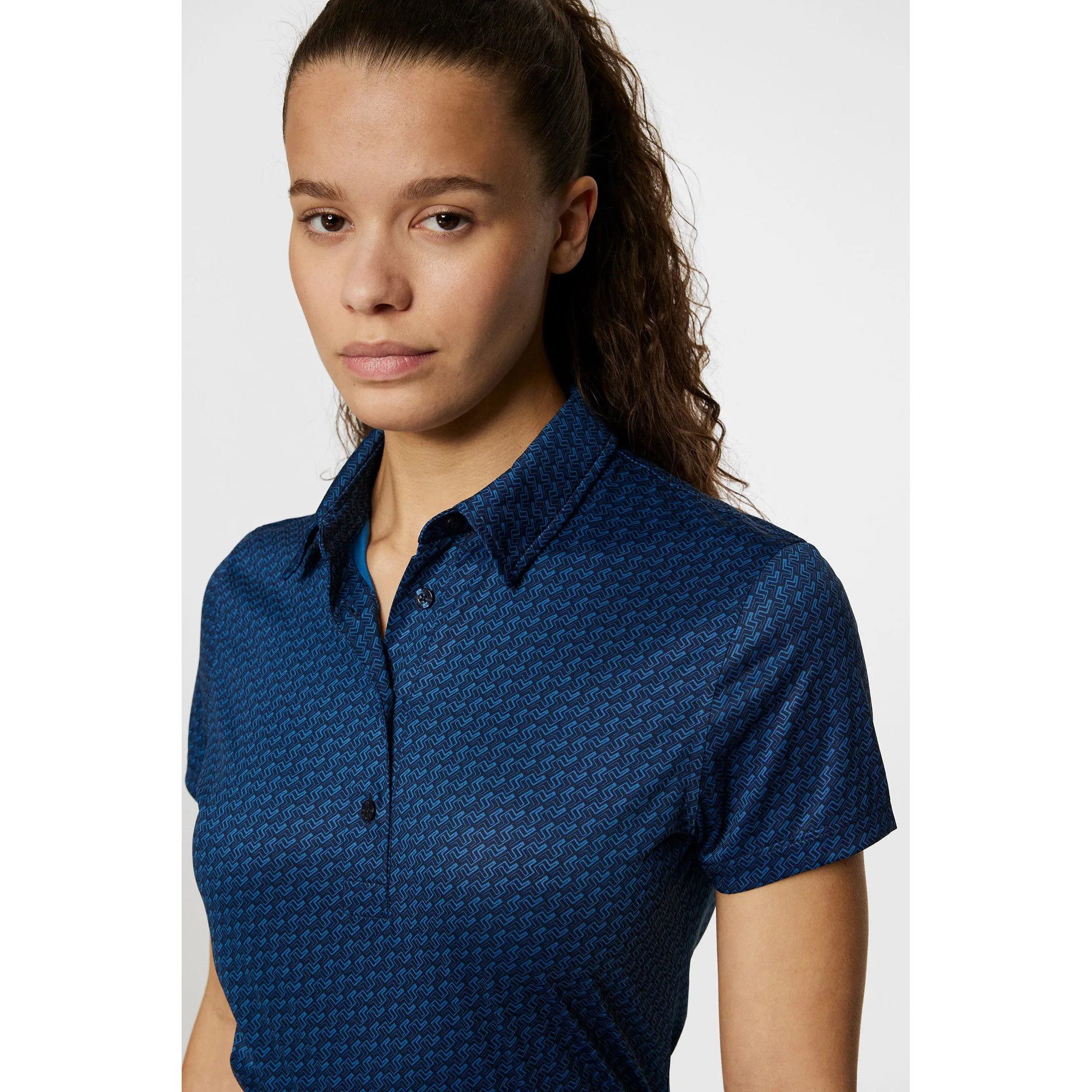 J.Lindeberg Women's Caitlyn Golf Polo Shirt - Shadow Bridge Navy Tight Net Planet Care