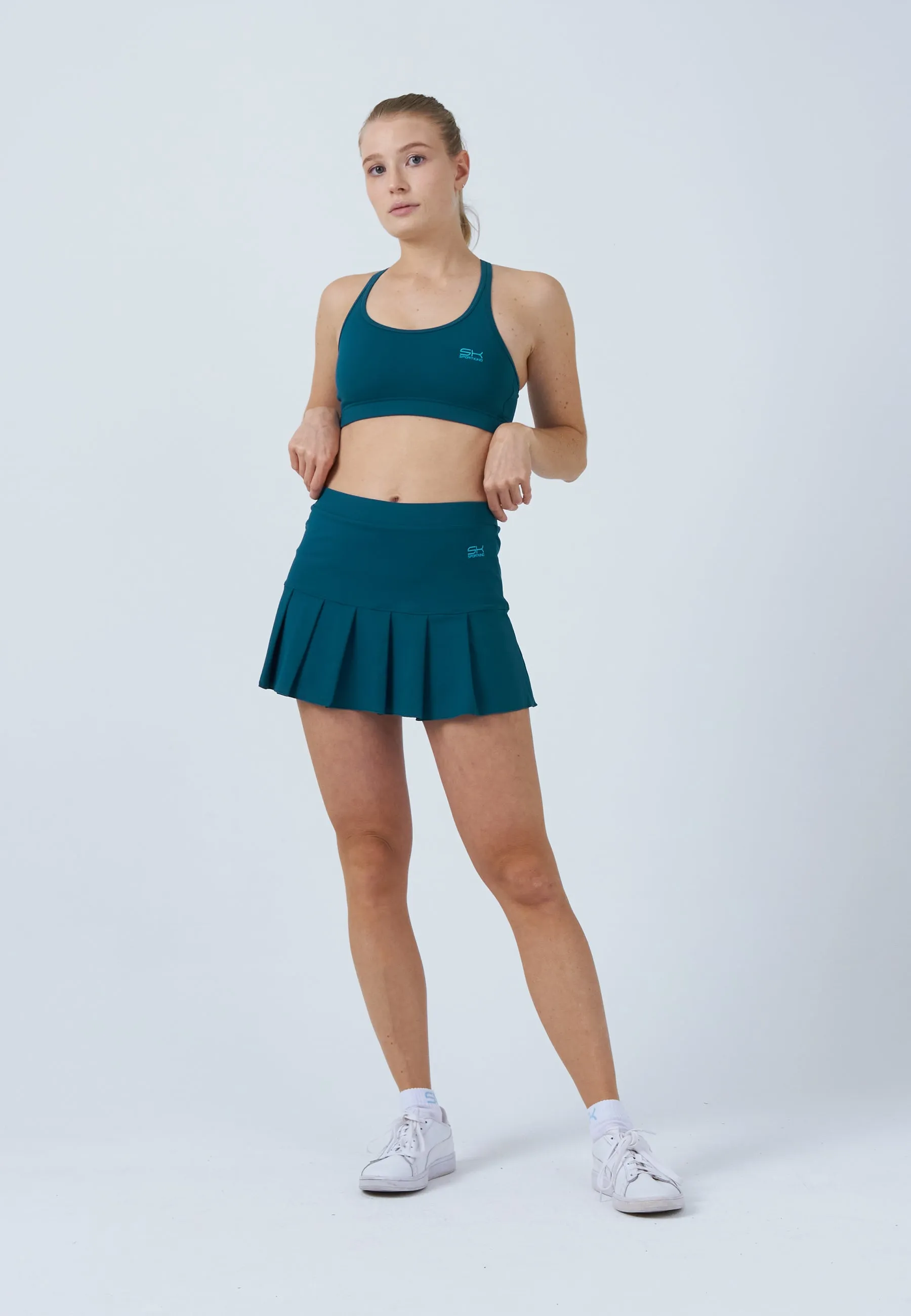 Pleated Tennis Skort, dark teal Water resistant coating Non Irritating Texture