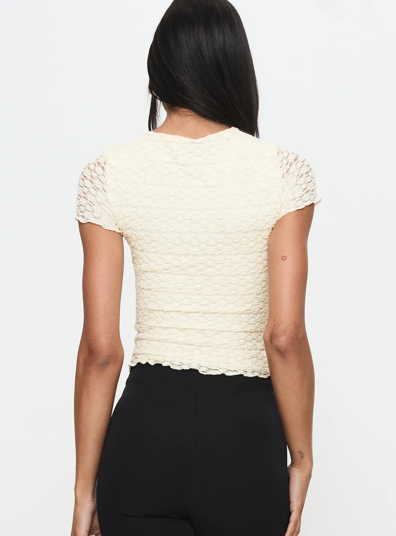 Simple Yet Cozy Non Restrictive Fit Moonsail Textured Top Cream