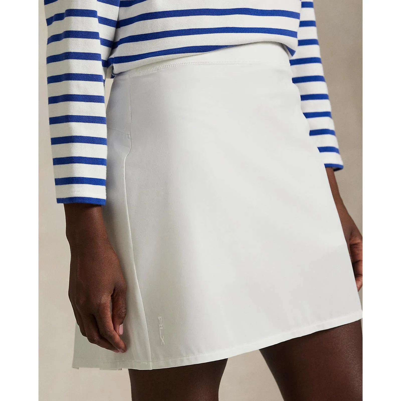 RLX Ralph Lauren Women's 17" Aim Pleated Back Golf Skort - Ceramic White Smart Edge Day To Night