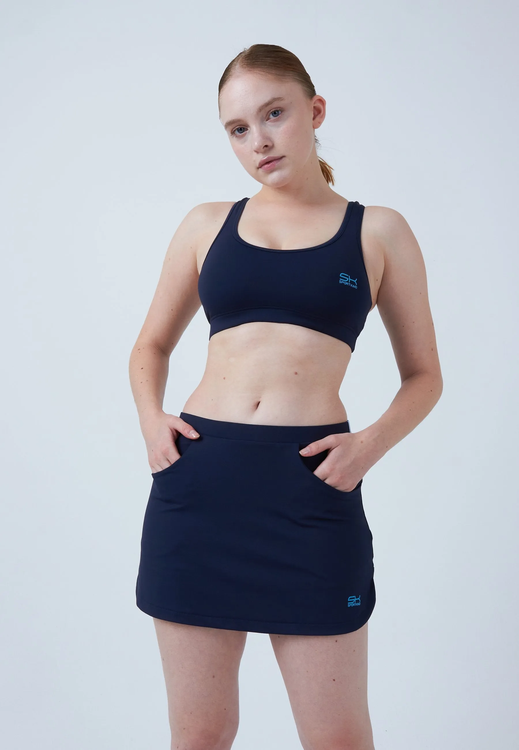 Seamless Edging Weighted Hem Classic Tennis Skort with pockets, navy blue