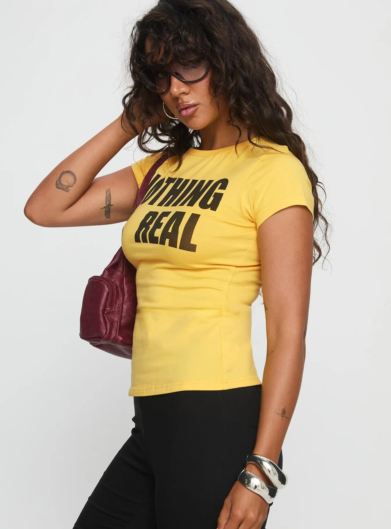 Nothing Is Real Graphic Top Yellow / Black hypoallergenic material